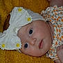 Mya participe au concours pour gagner de l'argent avec cette photo : baby, infant, headband, bow, flower_pattern, yellow_blanket, close_up, cute, face, skin, hand, eyes, clothing, portrait, child, newborn, cute_outfit, soft_texture, lying_down, peaceful