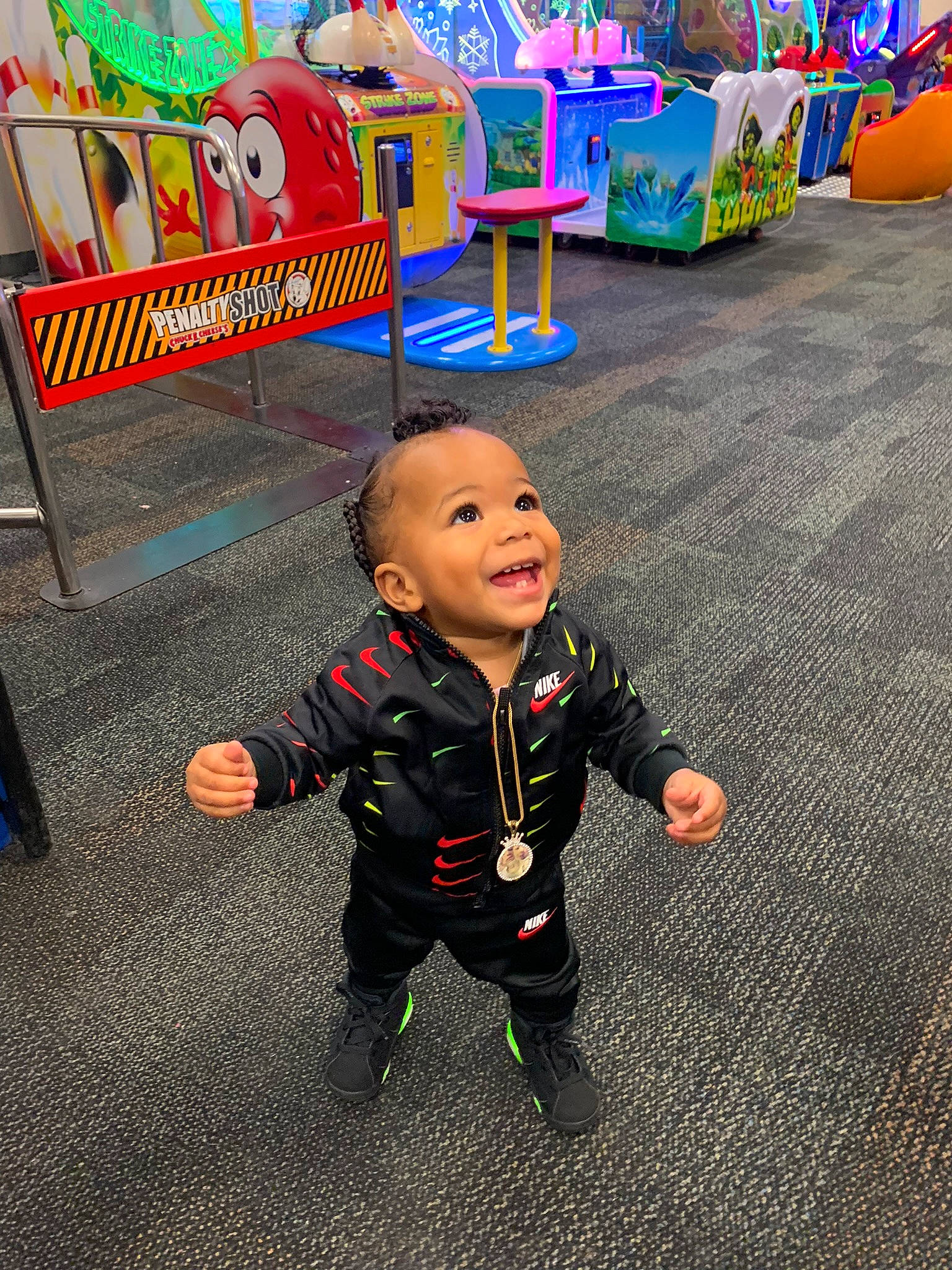 Lavelle Jr joined the competition — help win amazing prizes! asphalt, baby, baby_toddler_clothing, child, city, event, flooring, fun, happy, leisure, person, play, product, public_space, recreation, sitting, sleeve, smile, t_shirt, toddler