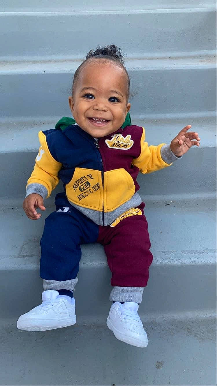 Lavelle Jr joined the competition — help win amazing prizes! arm, baby_toddler_clothing, child, electric_blue, eye, face, finger, gesture, glove, happy, joy, organ, outerwear, person, photograph, skin, sleeve, smile, sneakers, standing