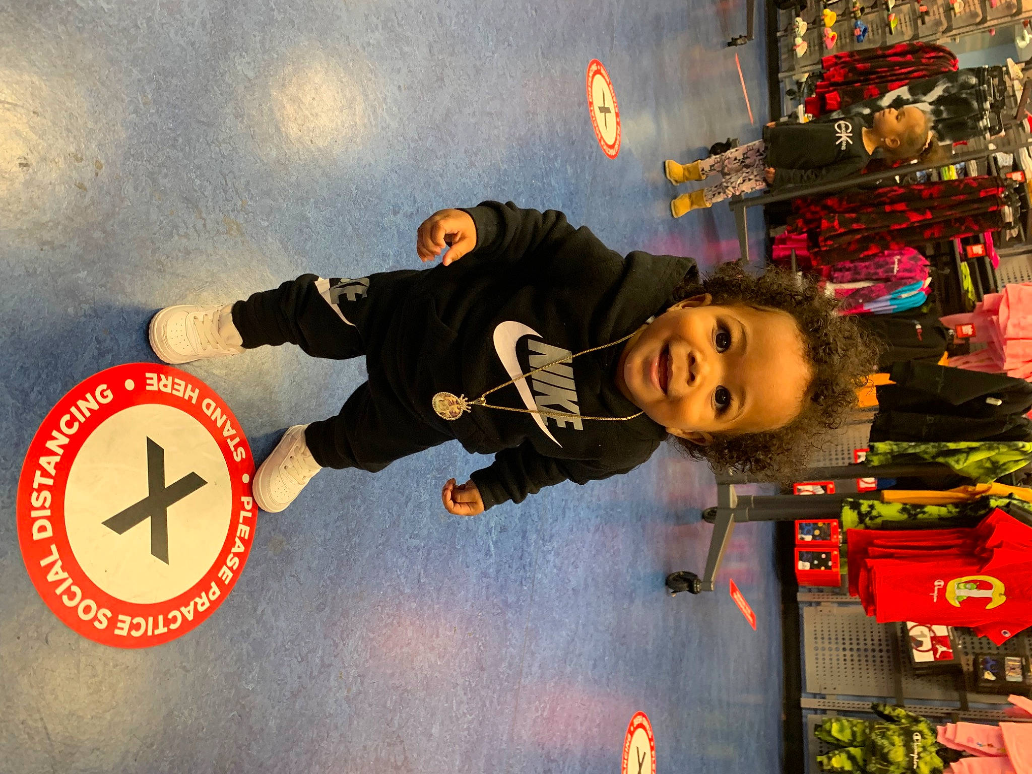 Lavelle Jr is registered to the contest to win money with this photo: child, christmas, city, contact_sport, design, event, fictional_character, fun, happy, holiday, joy, leisure, logo, person, recreation, smile, toddler, under_exposed, winter, world