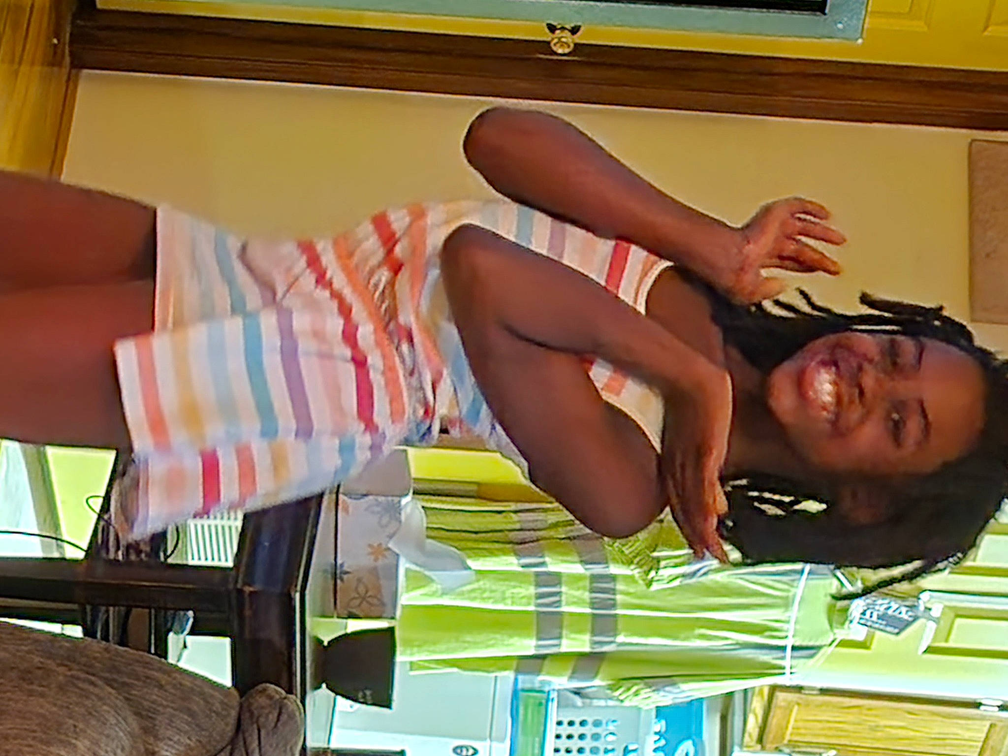 Corie is registered to the contest to win money with this photo: black_hair, brown_hair, comfort, elbow, fashion, fun, human_leg, joint, joy, knee, leisure, long_hair, person, room, shoulder, sitting, smile, thigh, trunk, waist