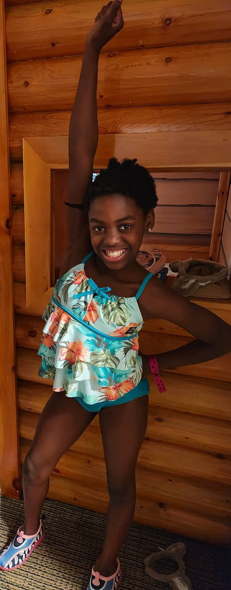 Corie is registered to the contest to win money with this photo: abdomen, black_hair, child, door, fashion_design, flash_photography, fun, happy, human_body, human_leg, joint, joy, knee, leg, leisure, person, shoulder, smile, thigh, toddler