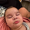 Toviyah is registered to the contest to win money with this photo: baby, sleeping, face, child, towel, skin, head, person, rest, closed_eyes, soft, comfort, indoors, pink, gray_clothing, cute, peaceful, relaxed, infant, portrait