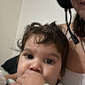 Toviyah joined the competition — help win amazing prizes! toddler, child, baby, person, face, hand, thumb, hair, clothing, headset, adult, smile, indoor, wall, blanket, comfort, casual, portrait, closeup, candid