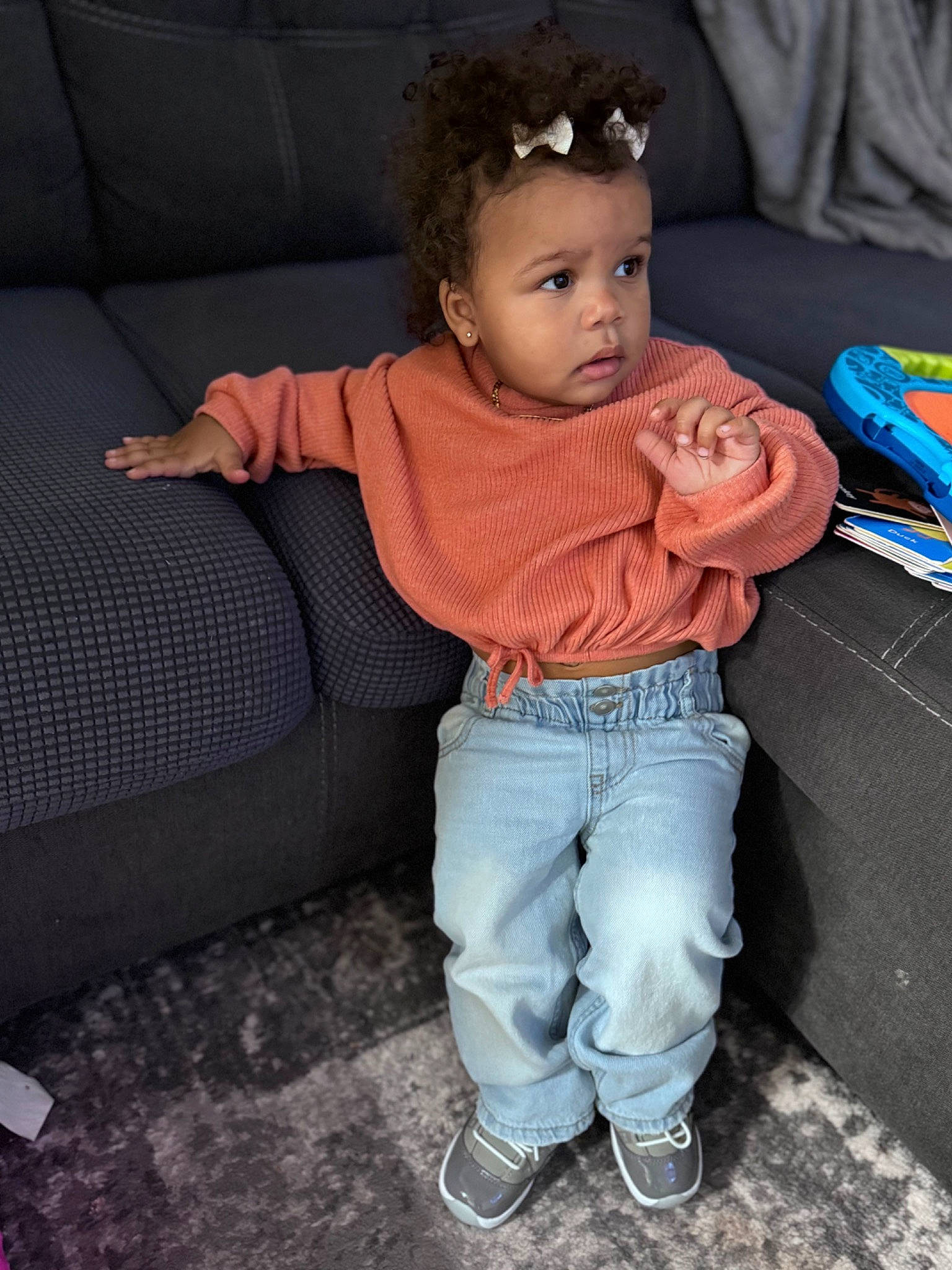 Zayla joined the competition — help win amazing prizes! baby, baby_toddler_clothing, child, comfort, cool, couch, denim, eye, fashion_accessory, footwear, fun, happy, head, headband, human_leg, leisure, person, sitting, thigh, toddler