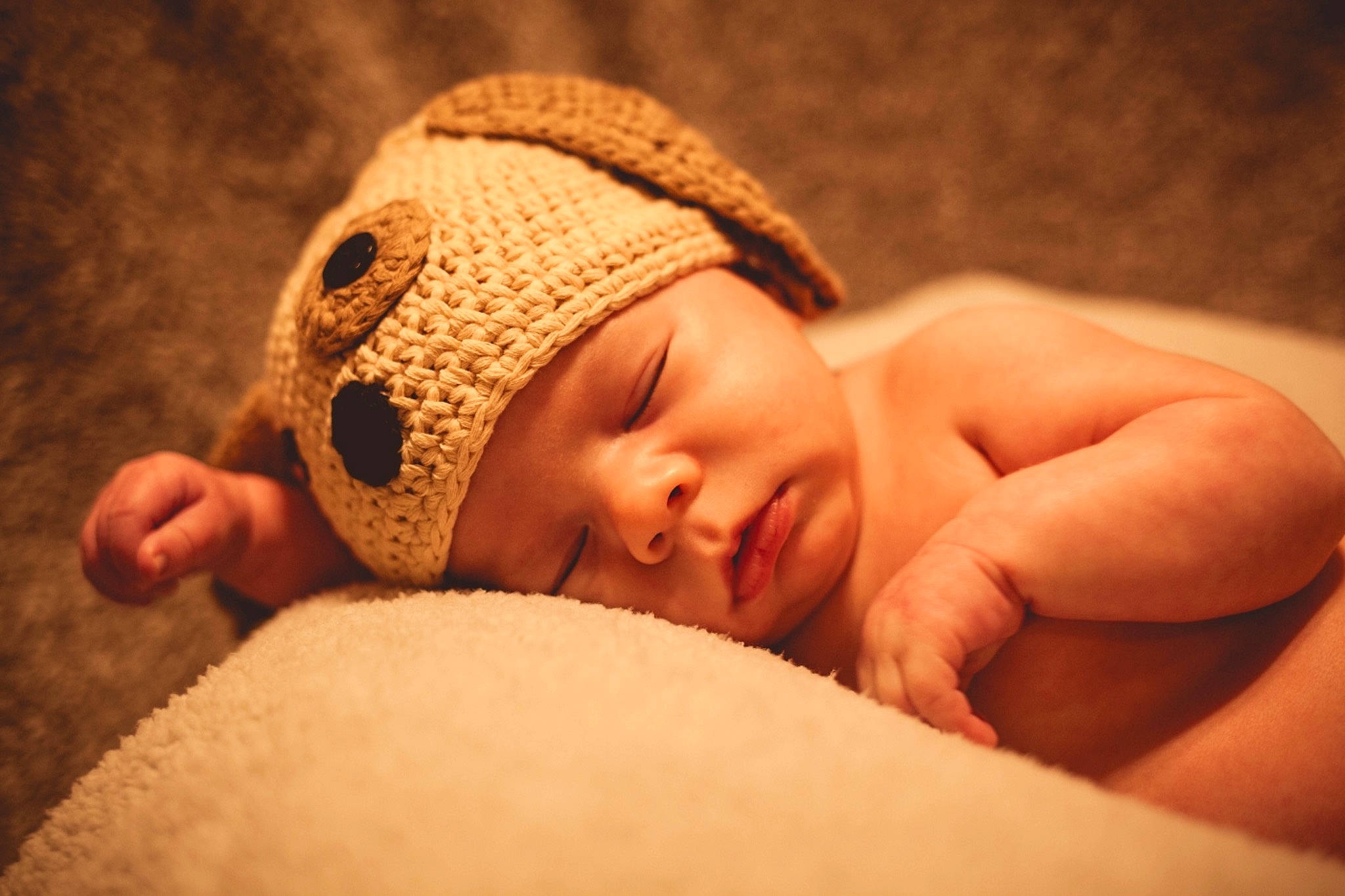 Ezrah is registered to the contest to win money with this photo: baby, baby_sleeping, beanie, bonnet, cap, child, happy, hat, headgear, headwear, knit_cap, person, photography, portrait_photography, skin, toddler