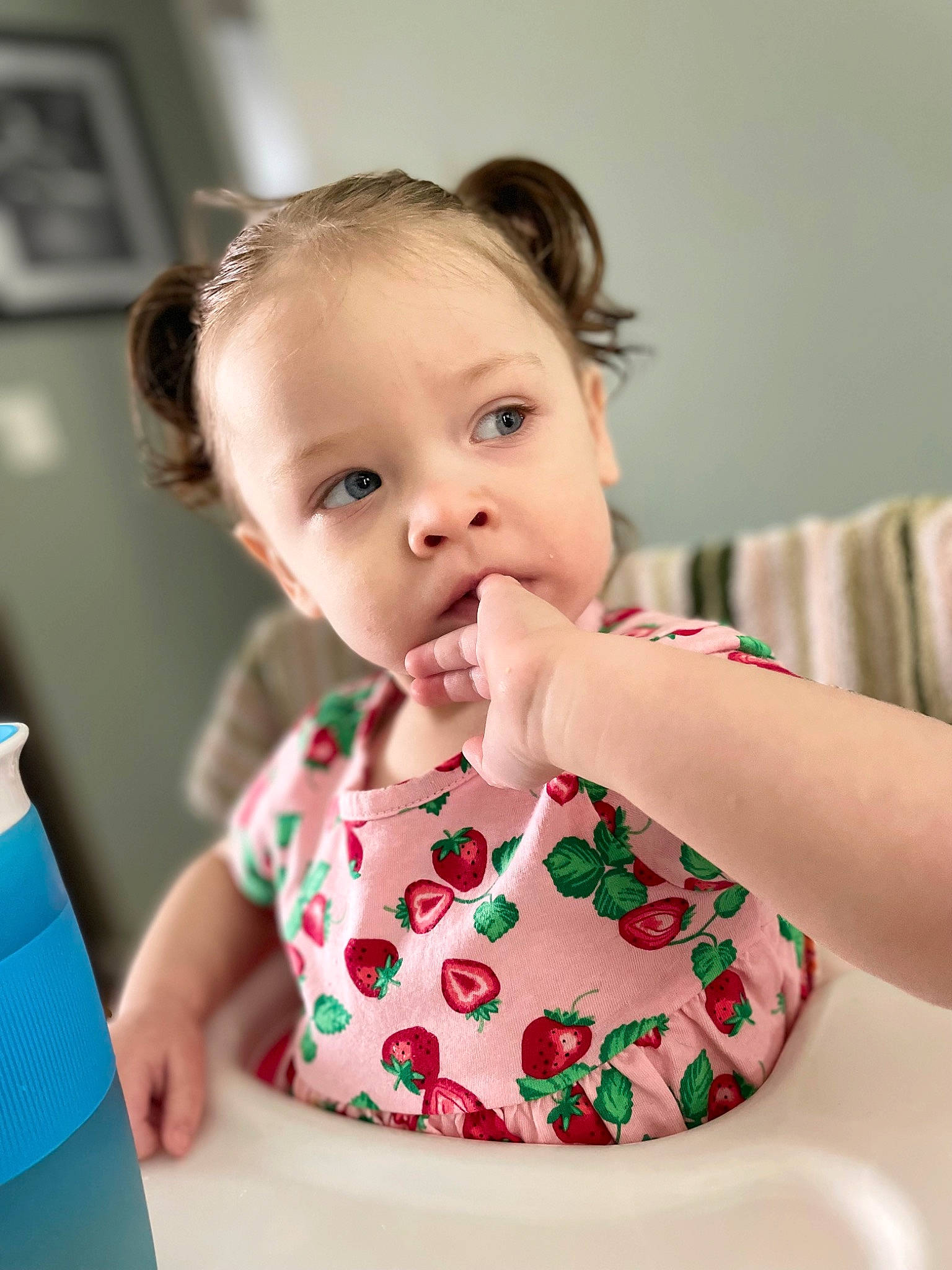 Zophia J is registered to the contest to win money with this photo: baby, baby_toddler_clothing, cheek, child, eating, eyelash, face, fun, hairstyle, happy, neck, pattern, person, plastic_bottle, portrait_photography, sitting, skin, sleeve, sweetness, toddler