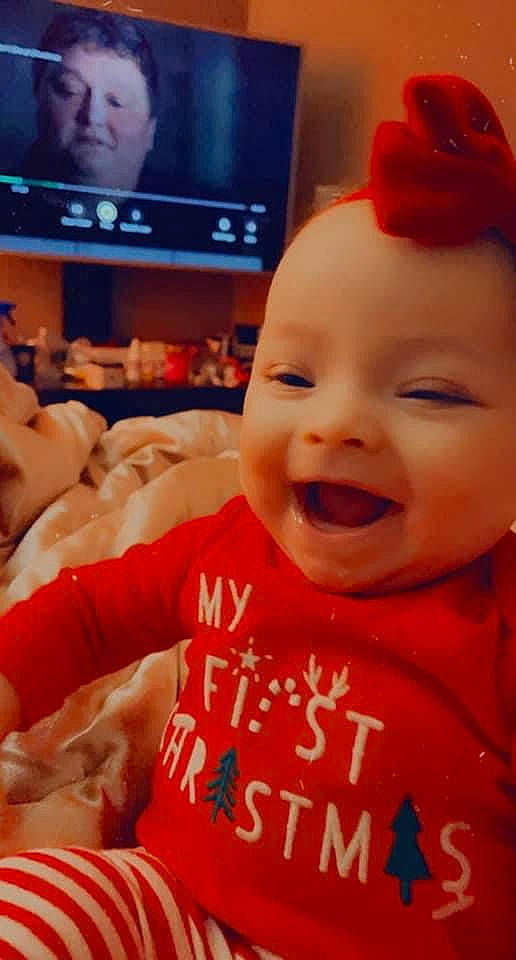 Zophia is registered to the contest to win money with this photo: baby, baby_laughing, cheek, chin, cool, finger, forehead, fun, happy, iris, lip, mouth, nose, organ, person, skin, smile, t_shirt, television, television_set