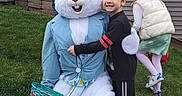 Ben is registered to the contest to win money with this photo: child, boy, easter_bunny, mascot, costume, grass, outdoor, house, window, smile, happy, girl, jacket, basket, green, play, fun, holiday, celebration, spring
