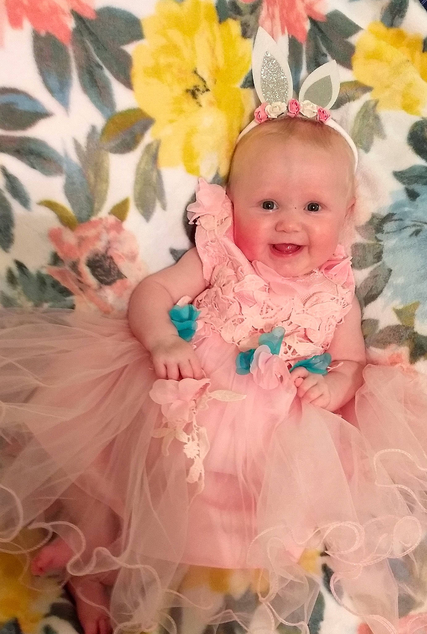 Thea is registered to the contest to win money with this photo: baby, baby_toddler_clothing, ballet_tutu, child, clothing, costume, dress, hair_accessory, headgear, joy, peach, person, petal, pink, product, textile, toddler