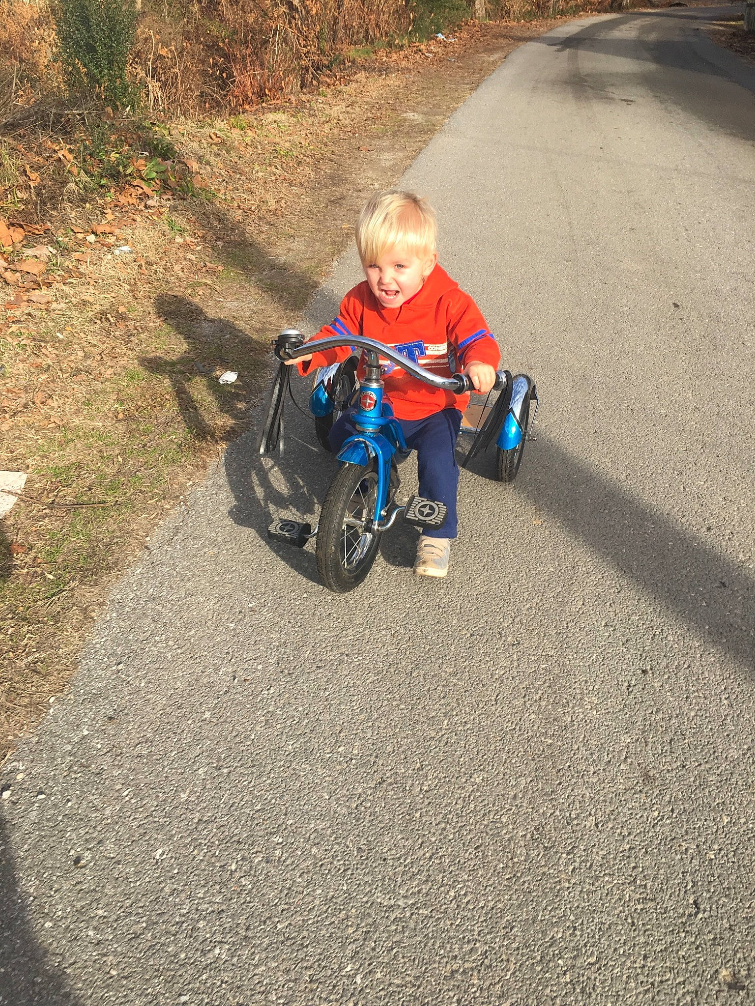 Zack joined the competition — help win amazing prizes! asphalt, bicycle_accessory, joy, person, product, riding_toy, toddler, tricycle, vehicle, wheel