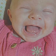Makenzie joined the competition — help win amazing prizes! baby, infant, smiling, laughing, pink_clothing, wooden_buttons, cushion, patterned_background, face, mouth_open, eyes_closed, portrait, child, happy, indoors, closeup, head, person, cute, baby_girl