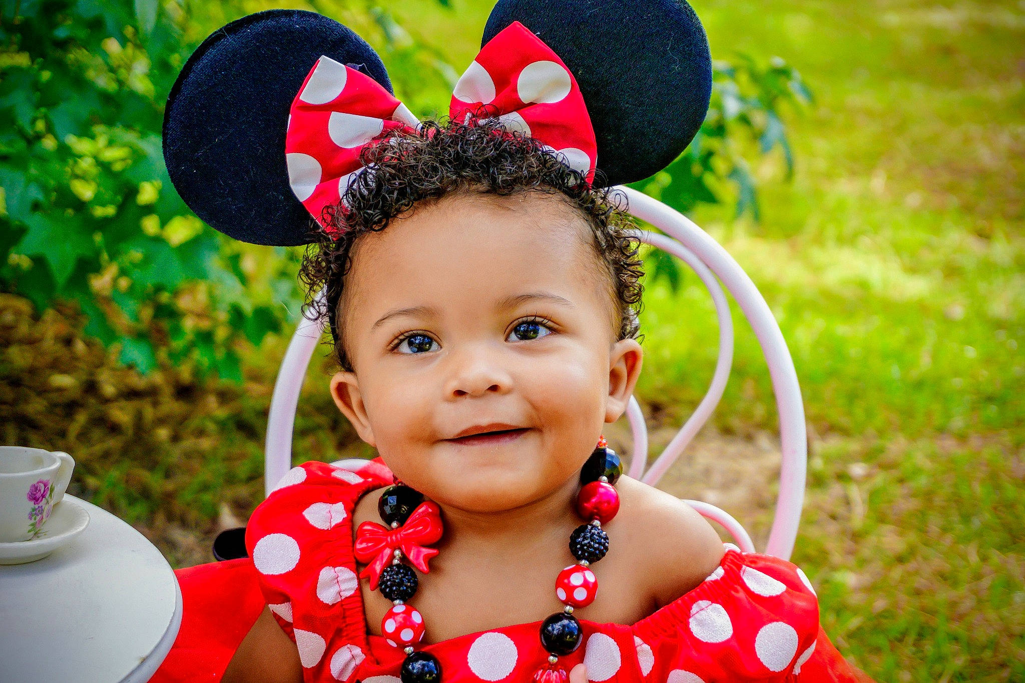 Maddelyn is registered to the contest to win money with this photo: baby, black_hair, child, costume, ear, face, fashion_accessory, hair, hair_accessory, happy, head, headband, headgear, headpiece, joy, pattern, person, photography, polka_dot, red