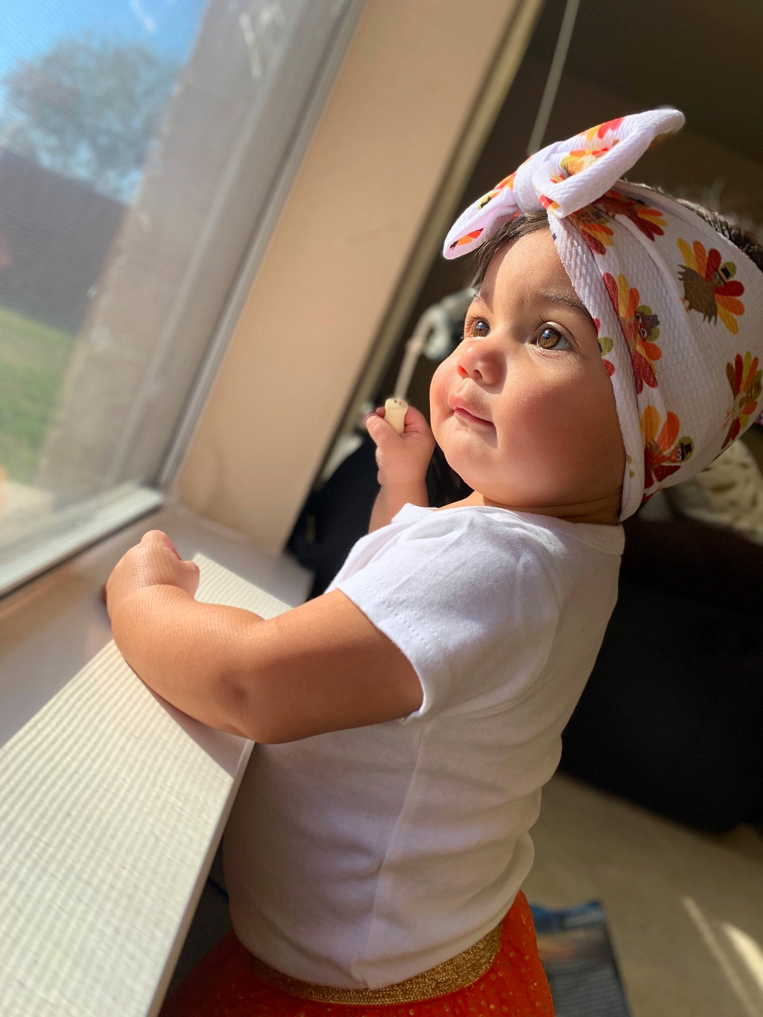 Anyah is registered to the contest to win money with this photo: baby, child, ear, fun, headgear, person, skin, toddler, vacation