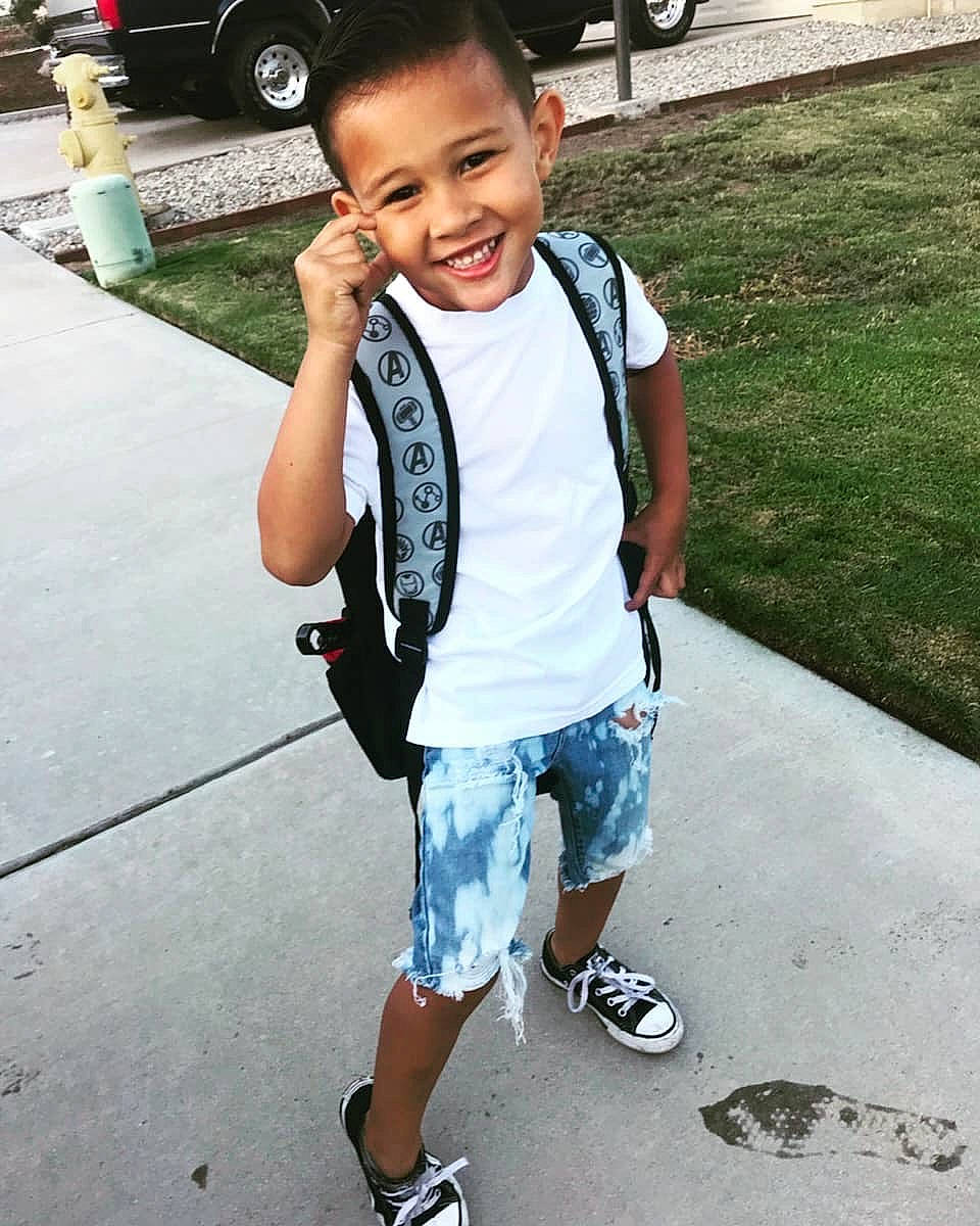 Zechariah is registered to the contest to win money with this photo: child, cool, footwear, fun, happy, jeans, joy, person, photography, play, recreation, shoe, smile, standing, style, summer, t_shirt, toddler, tourism, vacation