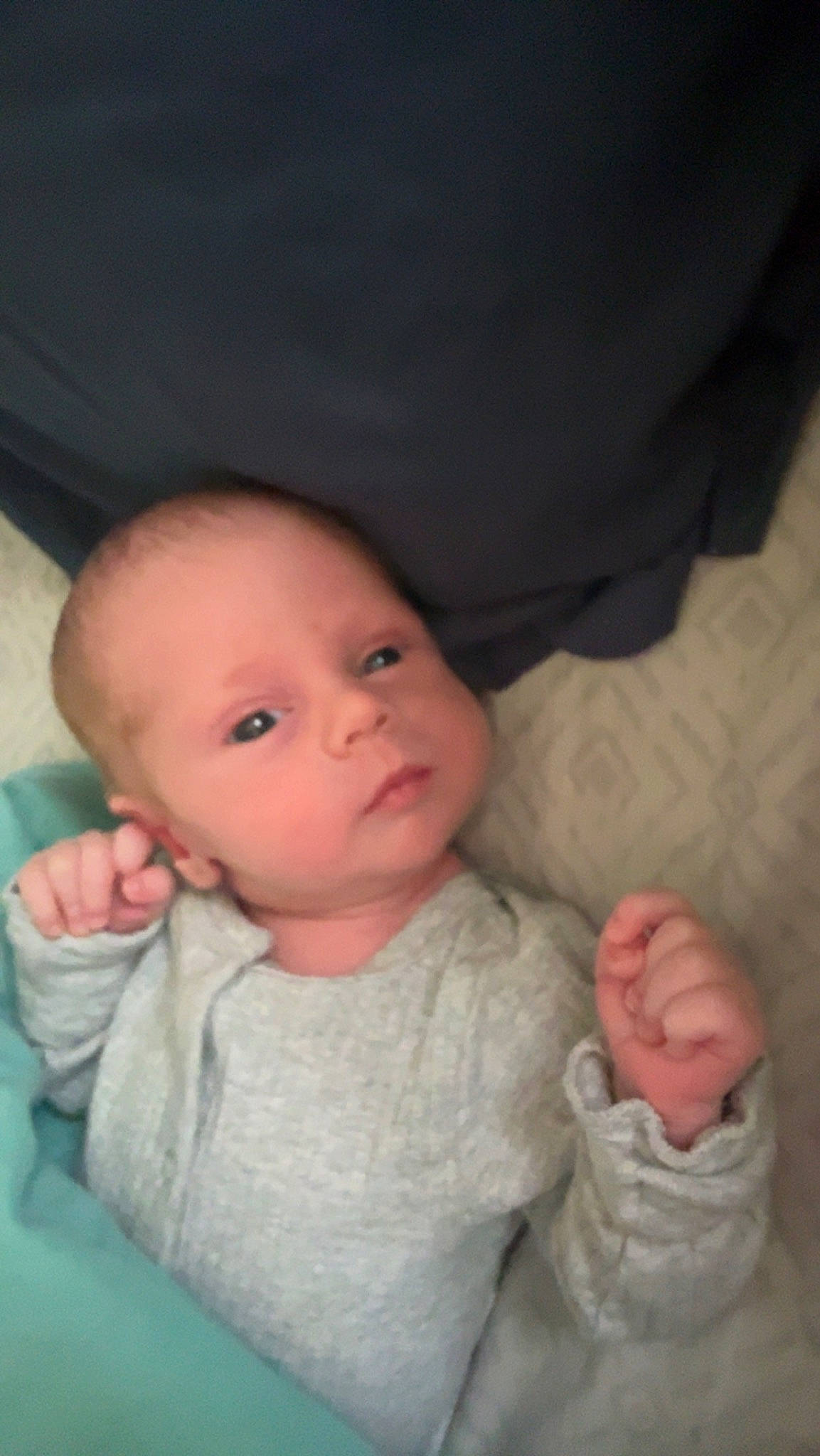 Hayes is registered to the contest to win money with this photo: baby, baby_toddler_clothing, cheek, child, comfort, ear, eye, eyebrow, finger, gesture, head, iris, lip, mouth, nose, person, sitting, skin, sleeve, thumb