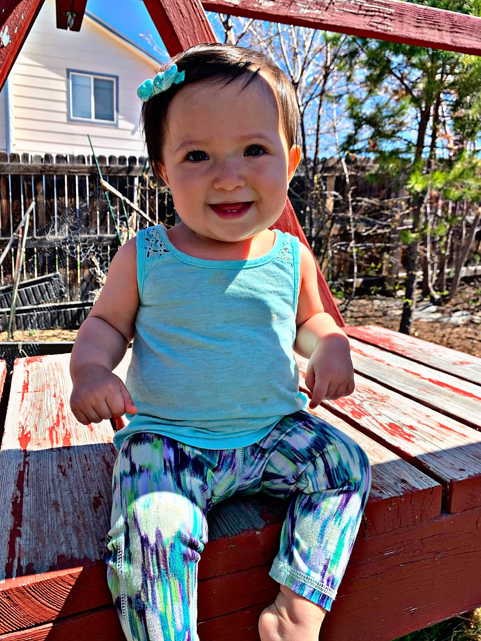 Mila is registered to the contest to win money with this photo: baby, baby_toddler_clothing, blue, child, happy, joy, leisure, people, person, play, sitting, smile, summer, t_shirt, toddler, tree, vacation