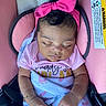 baby, sleeping, pink_bow, headband, blanket, car_seat, infant, peaceful, child, bracelet, pacifier, clothing, warning_label, seatbelt, toddler, cute, portrait, indoor, closeup, resting