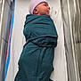 Oakley joined the competition — help win amazing prizes! newborn, baby, swaddled, pacifier, hospital, bassinet, blanket, hat, infant, bed, medical, sleeping, cute, child, person, lying_down, cozy, healthcare, nursery, hospital_room