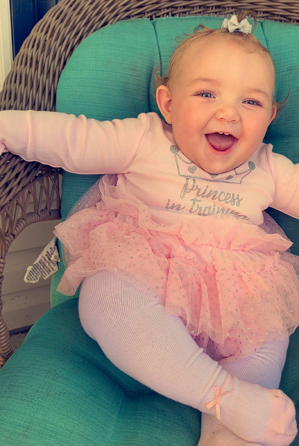 Camryn joined the competition — help win amazing prizes! baby, baby_toddler_clothing, cheek, child, comfort, eye, face, facial_expression, human, iris, laugh, lip, mouth, nose, person, pink, sitting, skin, toddler, tongue