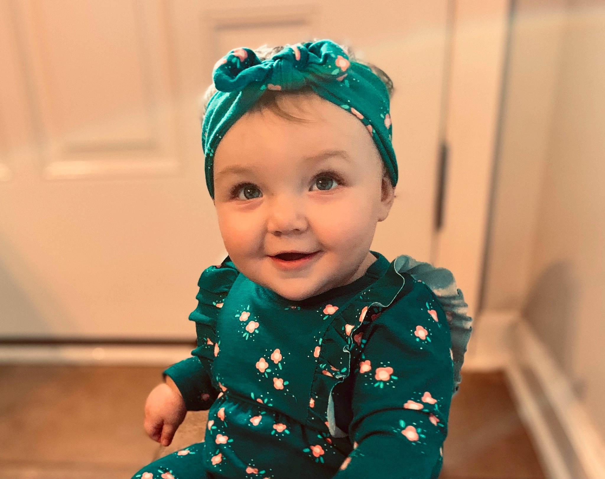Camryn is registered to the contest to win money with this photo: baby, baby_laughing, baby_toddler_clothing, child, costume_accessory, embellishment, fashion_accessory, hair_accessory, happy, headband, headgear, headpiece, joy, person, sleeve, toddler