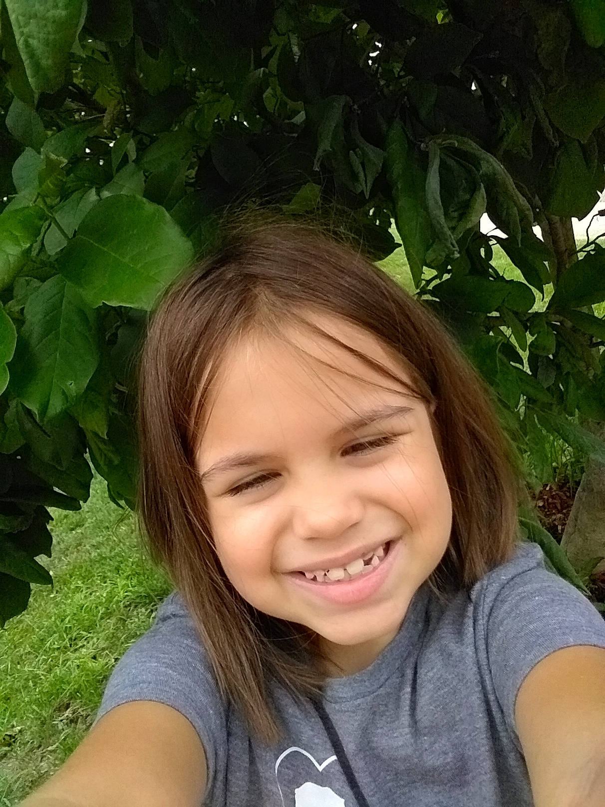 Danielle joined the competition — help win amazing prizes! botany, child, fun, grass, happy, iris, joy, leaf, leisure, lip, people_in_nature, person, plant, shrub, skin, smile, spring, summer, t_shirt, terrestrial_plant