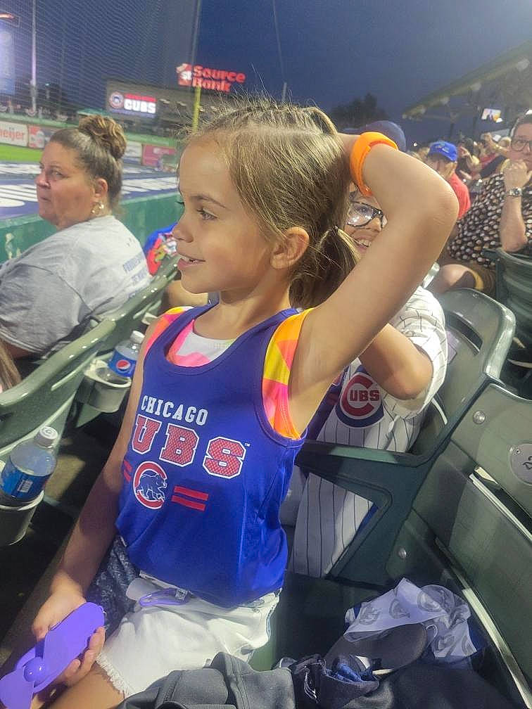 Danielle joined the competition — help win amazing prizes! arm, bag, bumper, child, competition_event, crowd, event, fan, fun, hairstyle, leisure, motor_vehicle, person, recreation, shorts, smile, sportswear, t_shirt, team, thigh