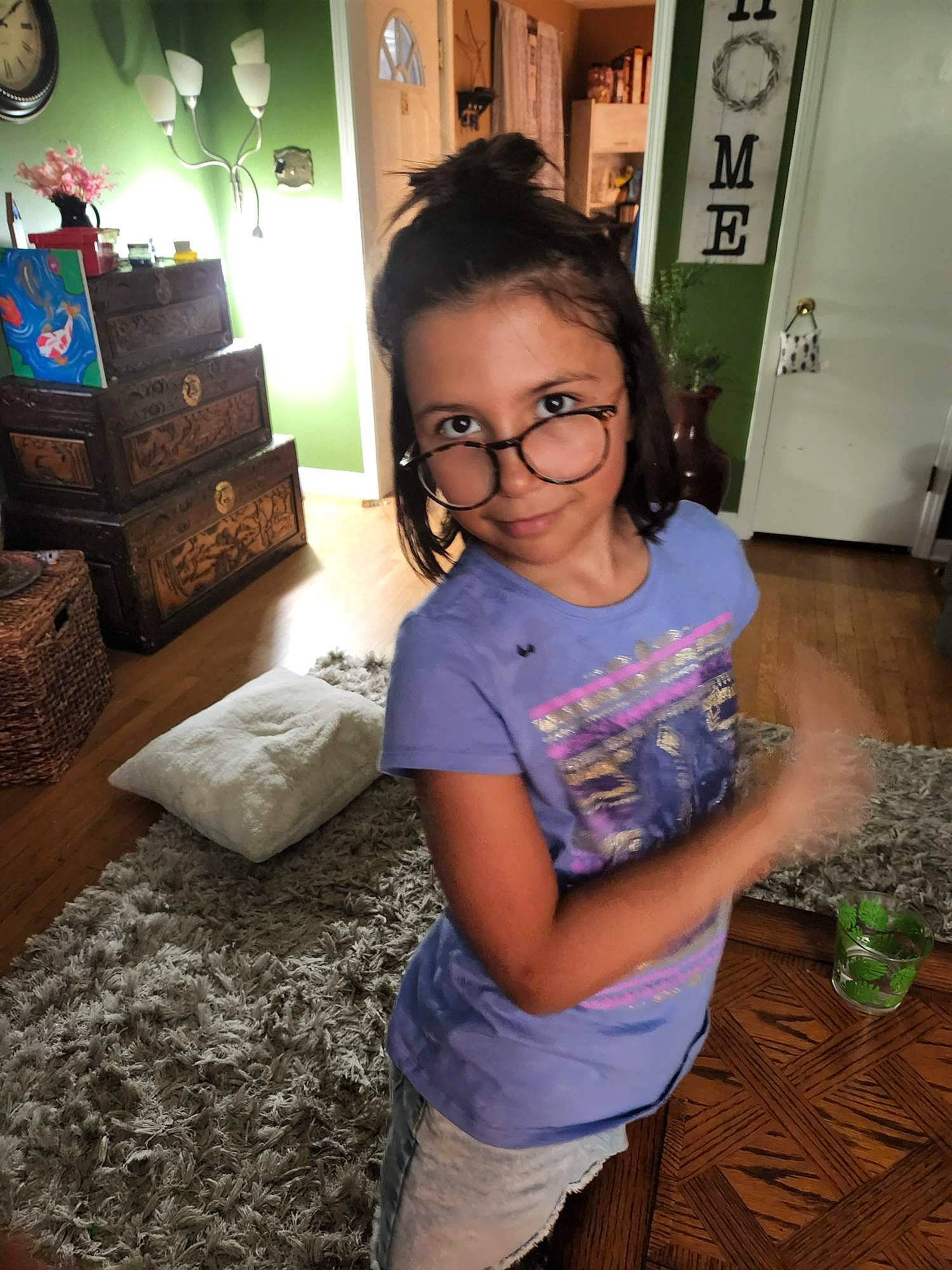 Maia is registered to the contest to win money with this photo: beauty, child, cool, eye, eyewear, fun, glasses, hair, happy, head, iris, joy, leisure, long_hair, mouth, person, plant, smile, standing, thigh