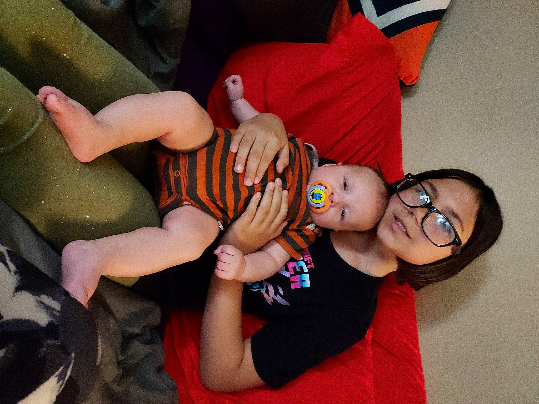 Maia is registered to the contest to win money with this photo: abdomen, baby, baby_toddler_clothing, child, costume, event, finger, fun, happy, hat, human_leg, knee, leg, leisure, mouth, nail, person, shorts, sitting, thigh