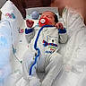 newborn, baby, infant, pacifier, onesie, bear, blanket, hospital, bassinet, sleeping, cozy, cute, clothing, child, person, bed, soft, rest, indoor, comfort