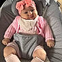 apparel, baby, baby_seat, child, comfort, cozy, cushion, cute, expression, fabric, face, hands, headband, indoors, infant, knit_sweater, legs, pink_bow, portrait, sock