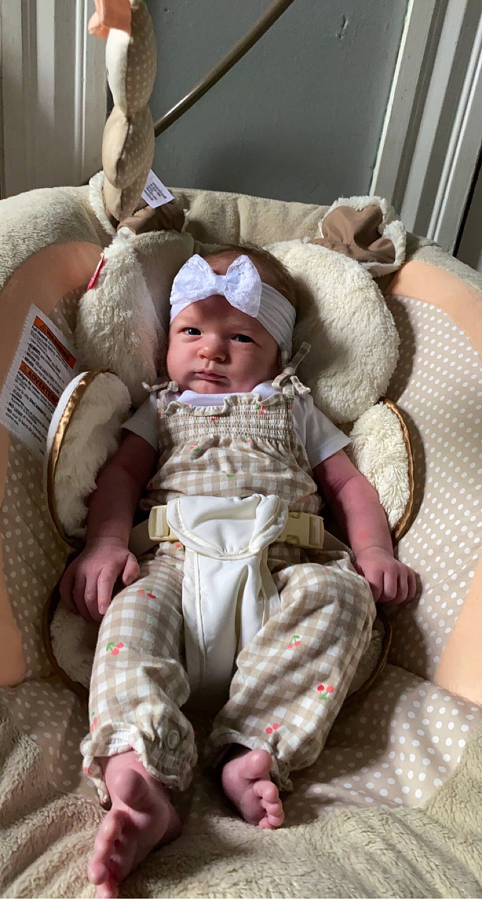 Primrose is registered to the contest to win money with this photo: baby, baby_carriage, baby_products, baby_sleeping, baby_toddler_clothing, cheek, child, comfort, ear, eye, head, headwear, human_body, lap, linens, mammal, person, room, sitting, skin