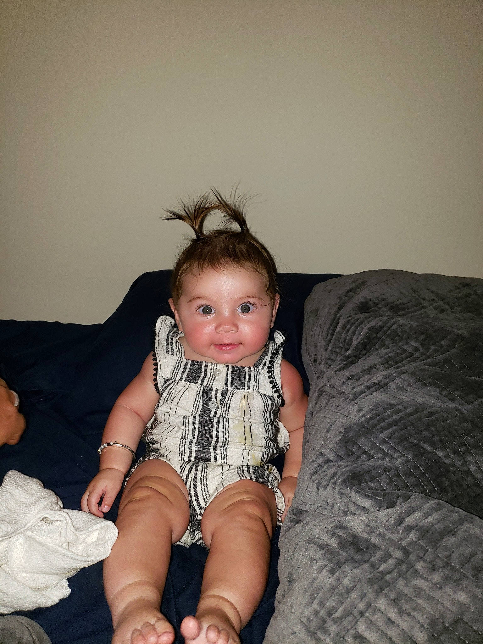 Olivia Grace is registered to the contest to win money with this photo: arm, baby, child, couch, ear, family, fun, furniture, human_leg, iris, joint, knee, leg, person, sitting, skin, smile, toddler, trunk, vacation