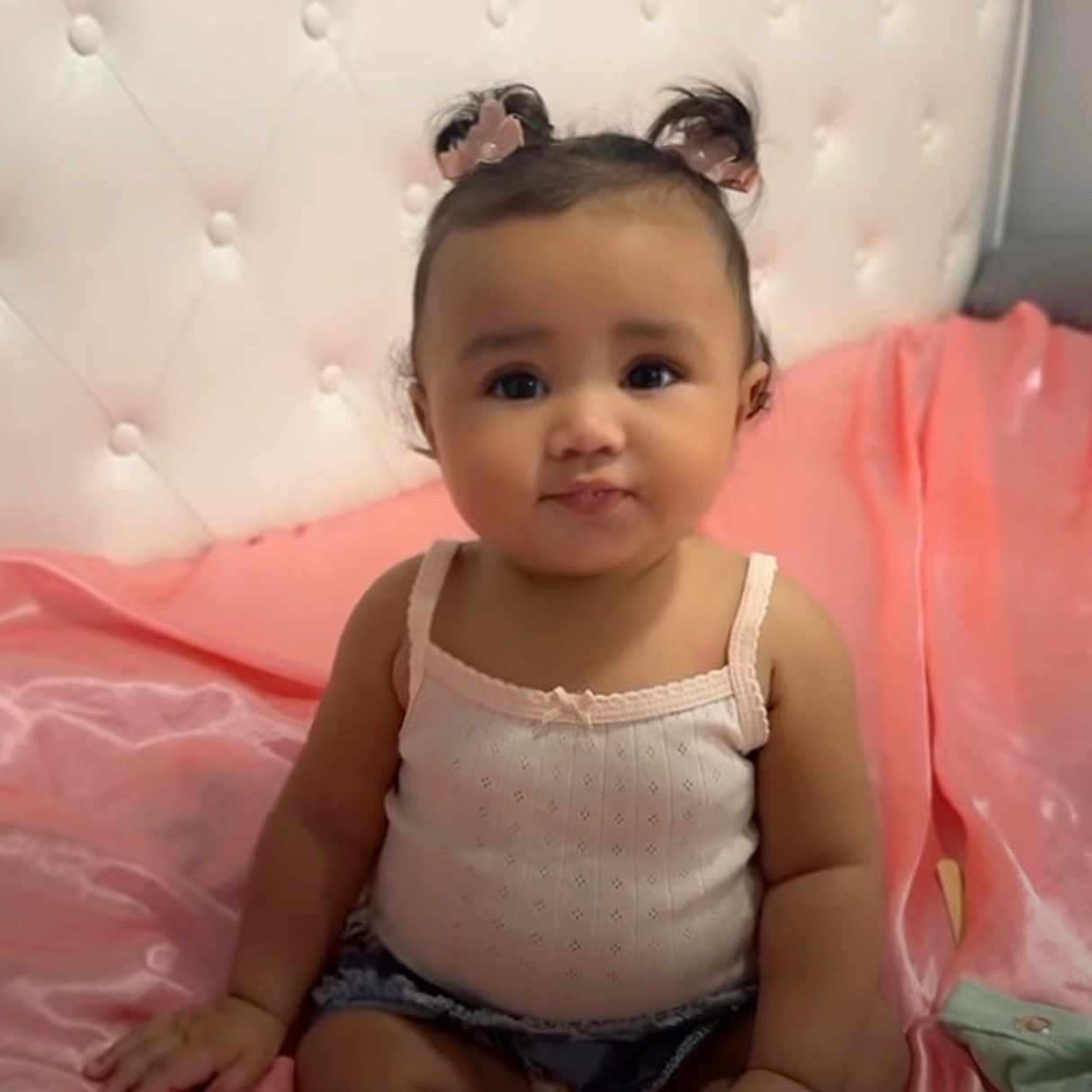 Malaya joined the competition — help win amazing prizes! baby, bed, child, cute, denim, foot, furniture, girl, hand, headboard, indoor, pigtails, pink, portrait, shorts, silk, sitting, skin, smile, top