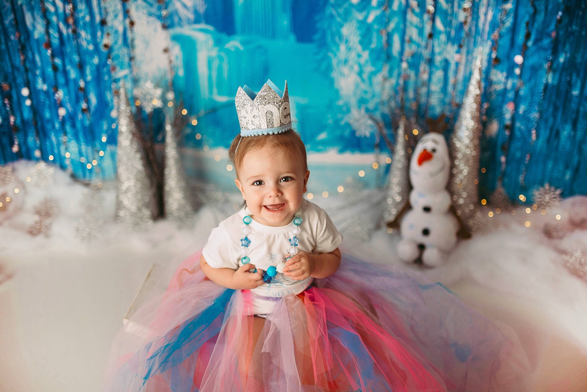 Reagan is registered to the contest to win money with this photo: aqua, beauty, blue, child, dress, event, fashion, fun, gown, happy, headpiece, joy, people, person, photograph, pink, recreation, smile, snapshot, toddler