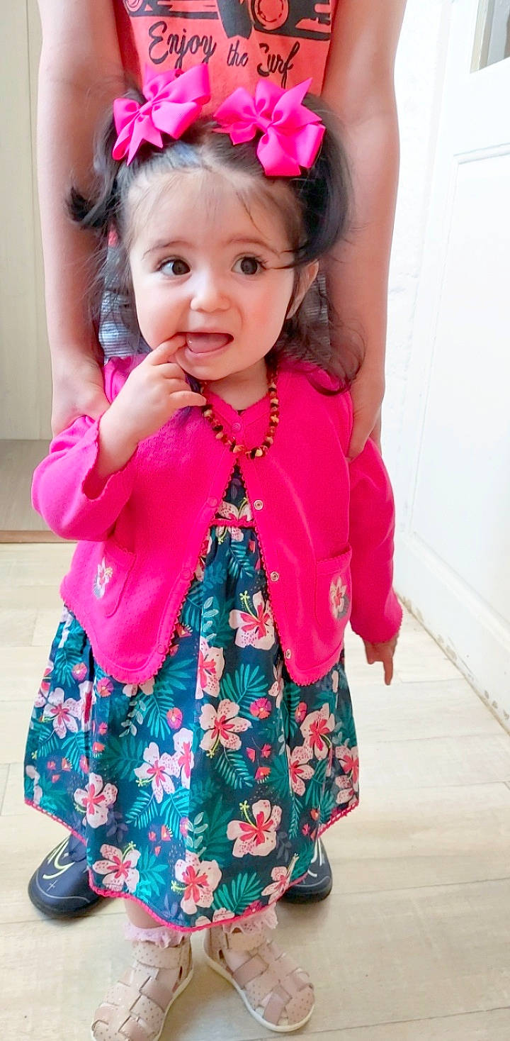 Ruby participe au concours pour gagner de l'argent avec cette photo : arm, baby_toddler_clothing, clothing, dress, eyelash, face, facial_expression, finger, happy, lip, neck, outerwear, person, pink, purple, shoulder, skin, sleeve, standing, toddler