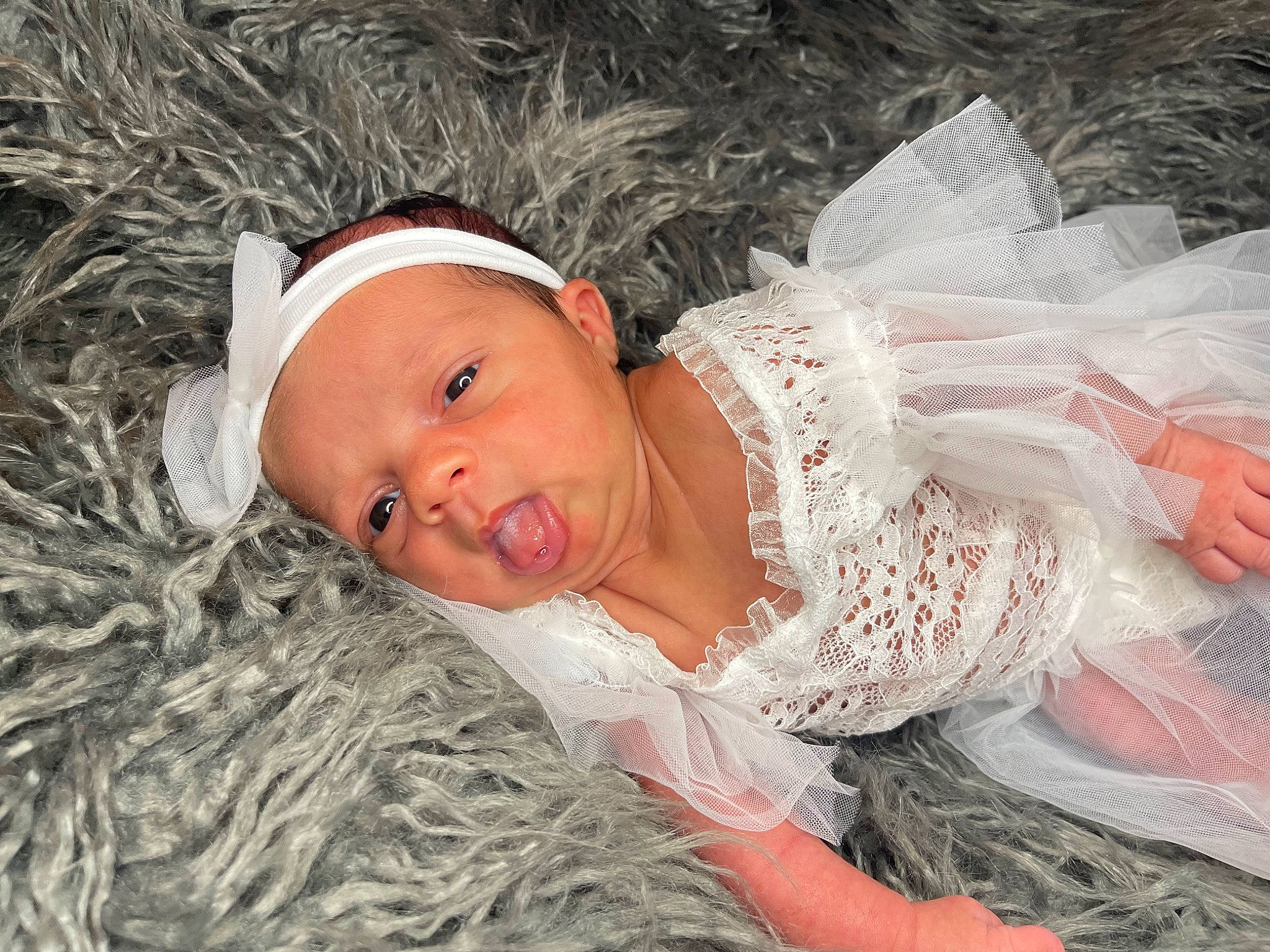 Ariyah is registered to the contest to win money with this photo: baby, baby_toddler_clothing, cap, child, embellishment, eyelash, fashion_accessory, fur, grass, hair_accessory, happy, headband, headgear, headpiece, jewellery, linens, pattern, person, skin, toddler