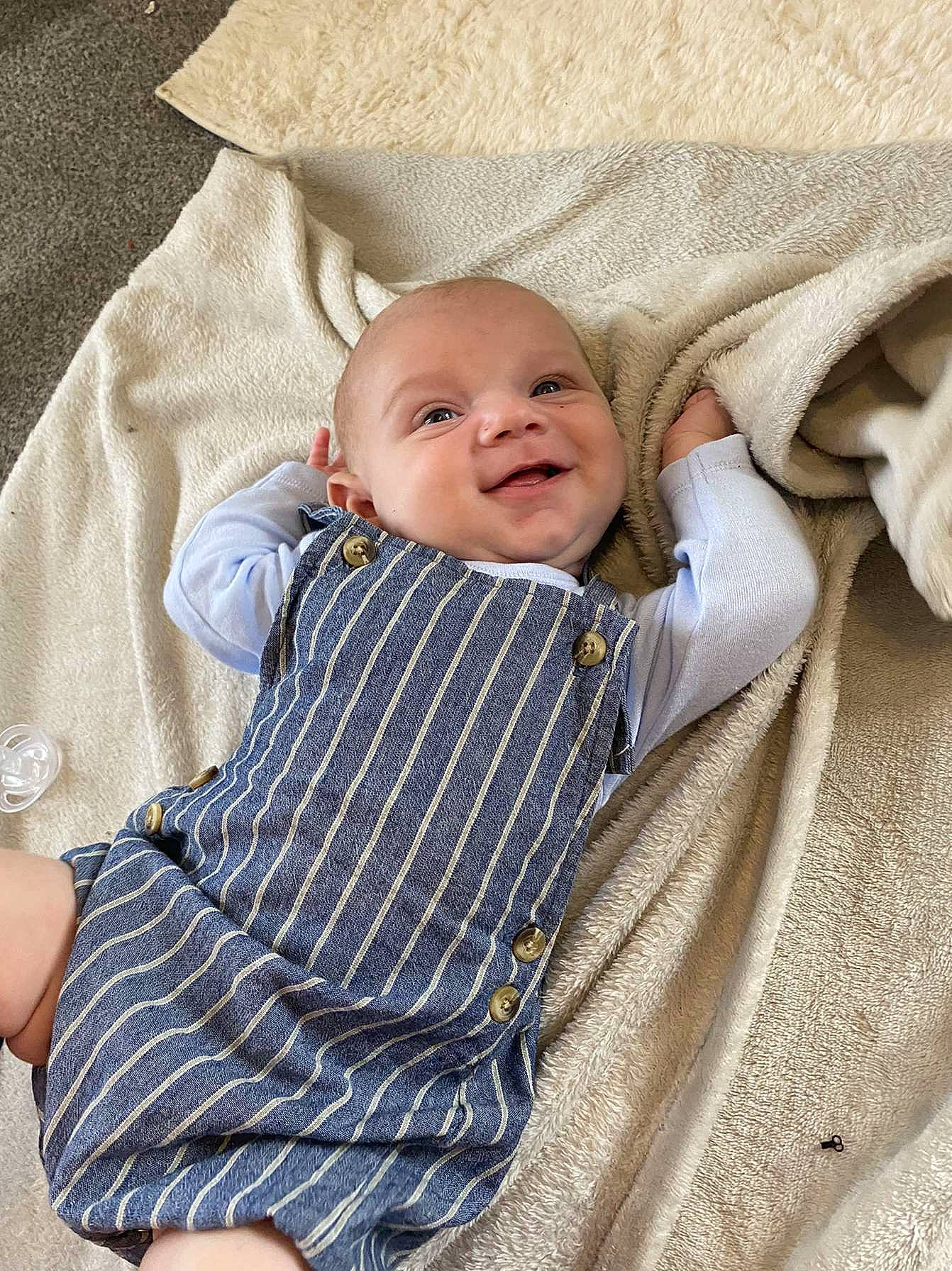 Kyson is registered to the contest to win money with this photo: baby, baby_toddler_clothing, cheek, child, collar, comfort, grass, happy, linens, pattern, person, product, skin, sleeve, smile, textile, toddler