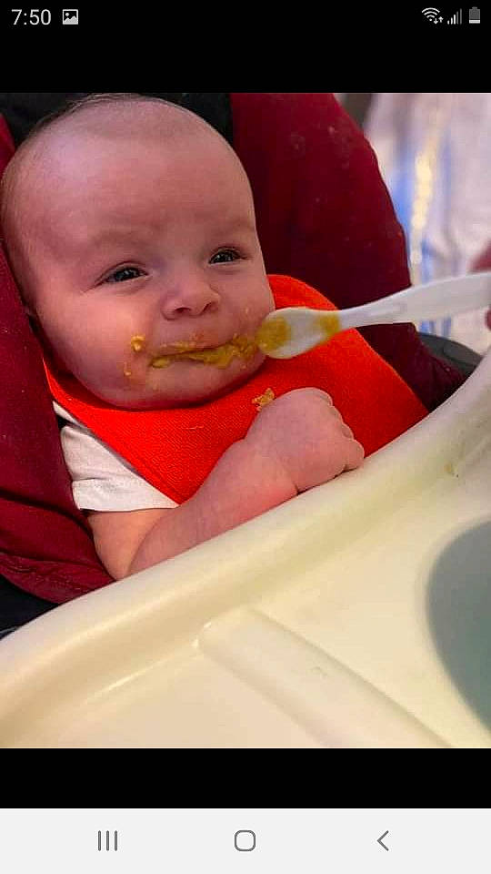 Kayne joined the competition — help win amazing prizes! baby, baby_products, baby_safety, baby_toddler_clothing, bib, carmine, cheek, child, comfort, dishware, eyebrow, finger, fun, happy, iris, lip, nose, person, sitting, tableware