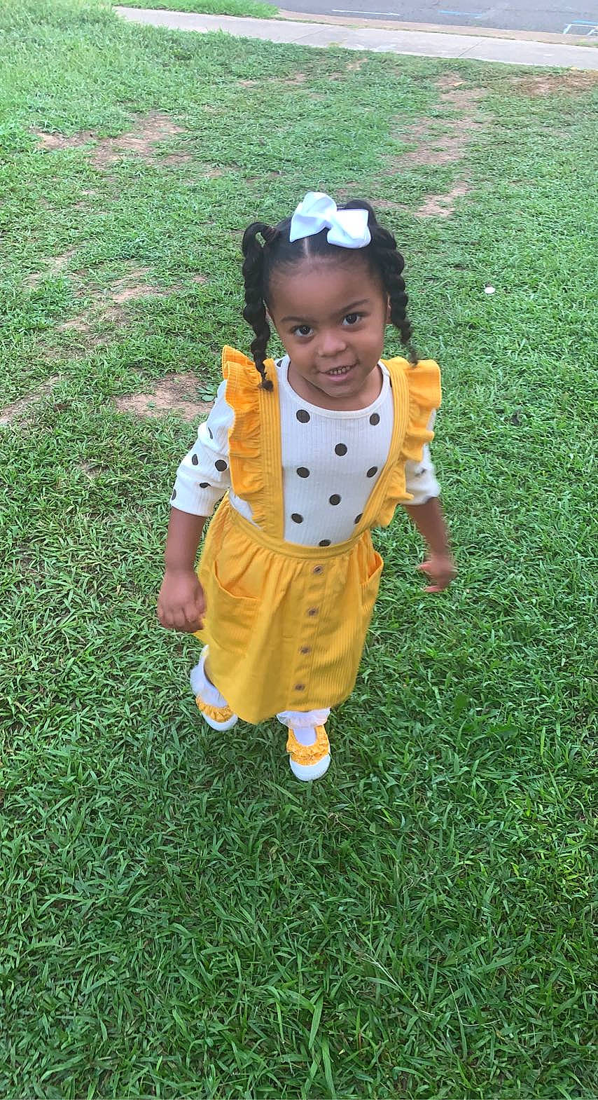 Alaia is registered to the contest to win money with this photo: baby_toddler_clothing, child, fun, grass, grassland, groundcover, happy, joy, leaf, leisure, pattern, people_in_nature, person, plant, recreation, sleeve, smile, toddler