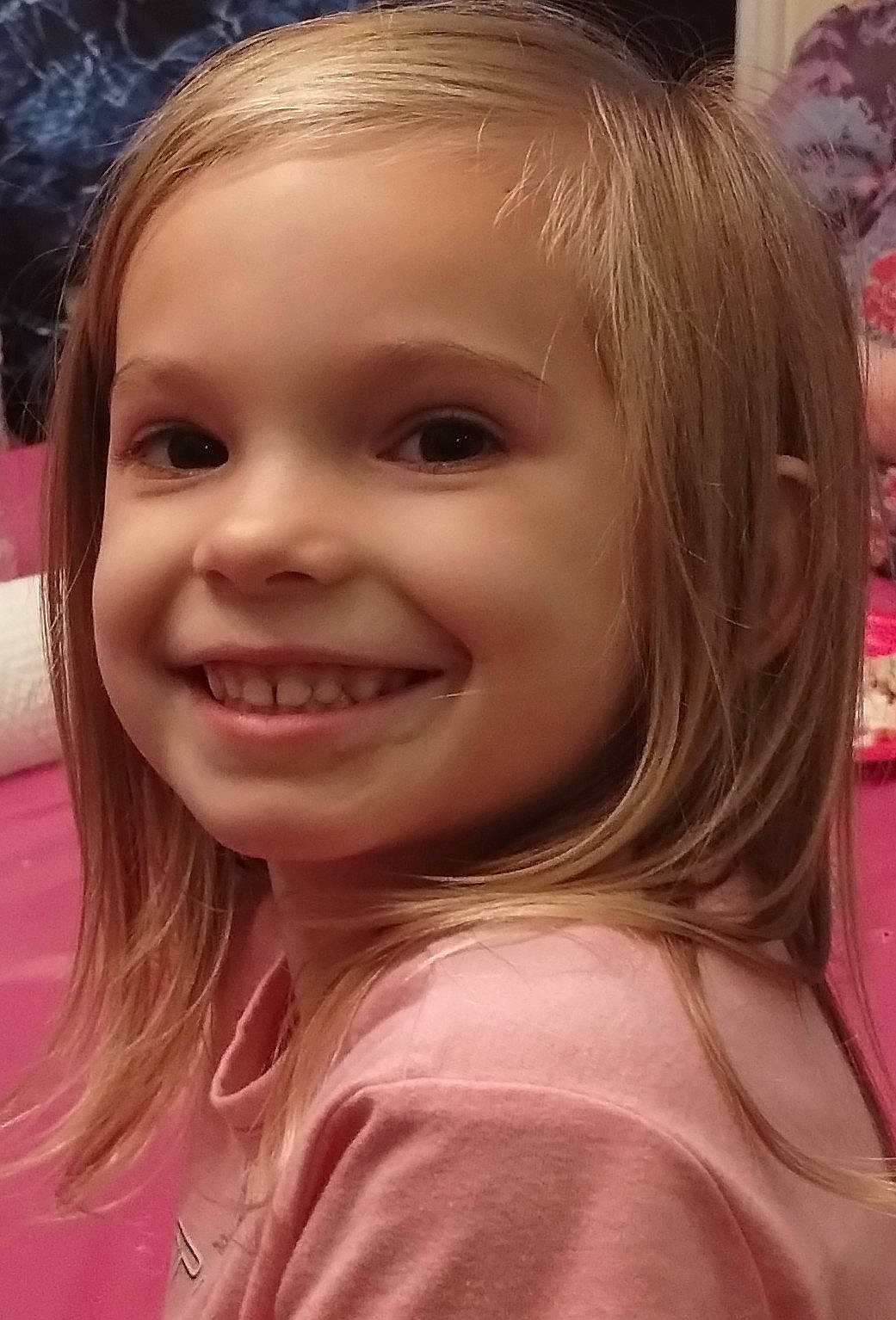 Kylie is registered to the contest to win money with this photo: blond, brown_hair, cheek, chin, close_up, eyebrow, eyelash, flash_photography, fun, happy, iris, joy, lip, long_hair, mouth, nose, person, pink, skin, smile