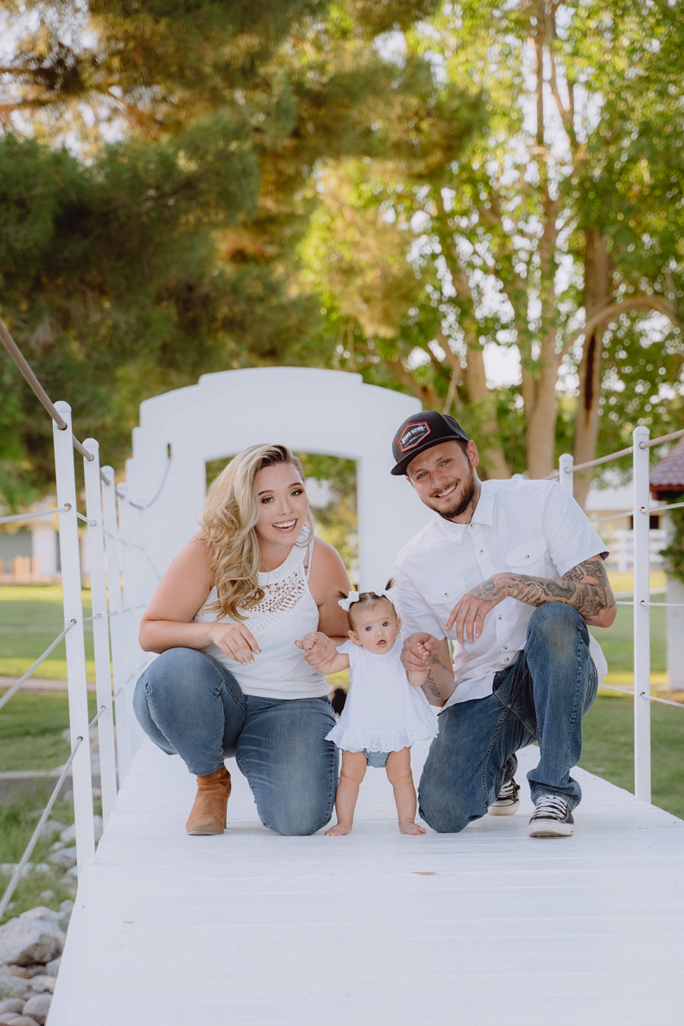 Layla is registered to the contest to win money with this photo: event, eyewear, fun, glasses, grass, happy, headwear, jeans, joy, leisure, people, person, photograph, plant, recreation, shorts, sitting, smile, spring, summer