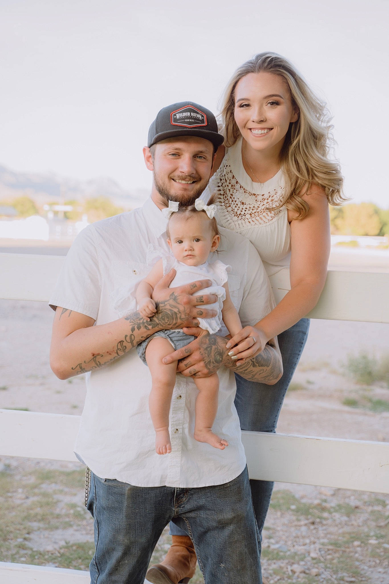 Layla is registered to the contest to win money with this photo: baby, baseball_cap, cap, child, event, face, flash_photography, friendship, fun, gesture, happy, hat, head, headwear, jeans, joy, people_in_nature, person, sky, smile