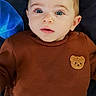 Mathias a rejoint le concours — aidez-le/la à gagner de superbes lots ! baby, blue_eyes, brown_sweater, child, cute, face, infant, indoors, looking_up, portrait, sitting, teddy_bear_patch, young_child, person, clothing, head, skin, expression, eyes, hair
