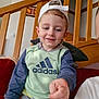 Noah participe au concours pour gagner de l'argent avec cette photo : child, boy, cap, adidas, sweatshirt, pants, smile, face, hand, indoor, stairs, wood, cushion, sofa, casual, young, person, clothing, portrait, happy