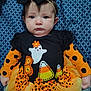 Adalyn is registered to the contest to win money with this photo: baby, child, infant, halloween, costume, dress, bow, headband, ghost, candy_corn, polka_dot, orange, black, yellow, tulle, tutu, pattern, blanket, cute, portrait