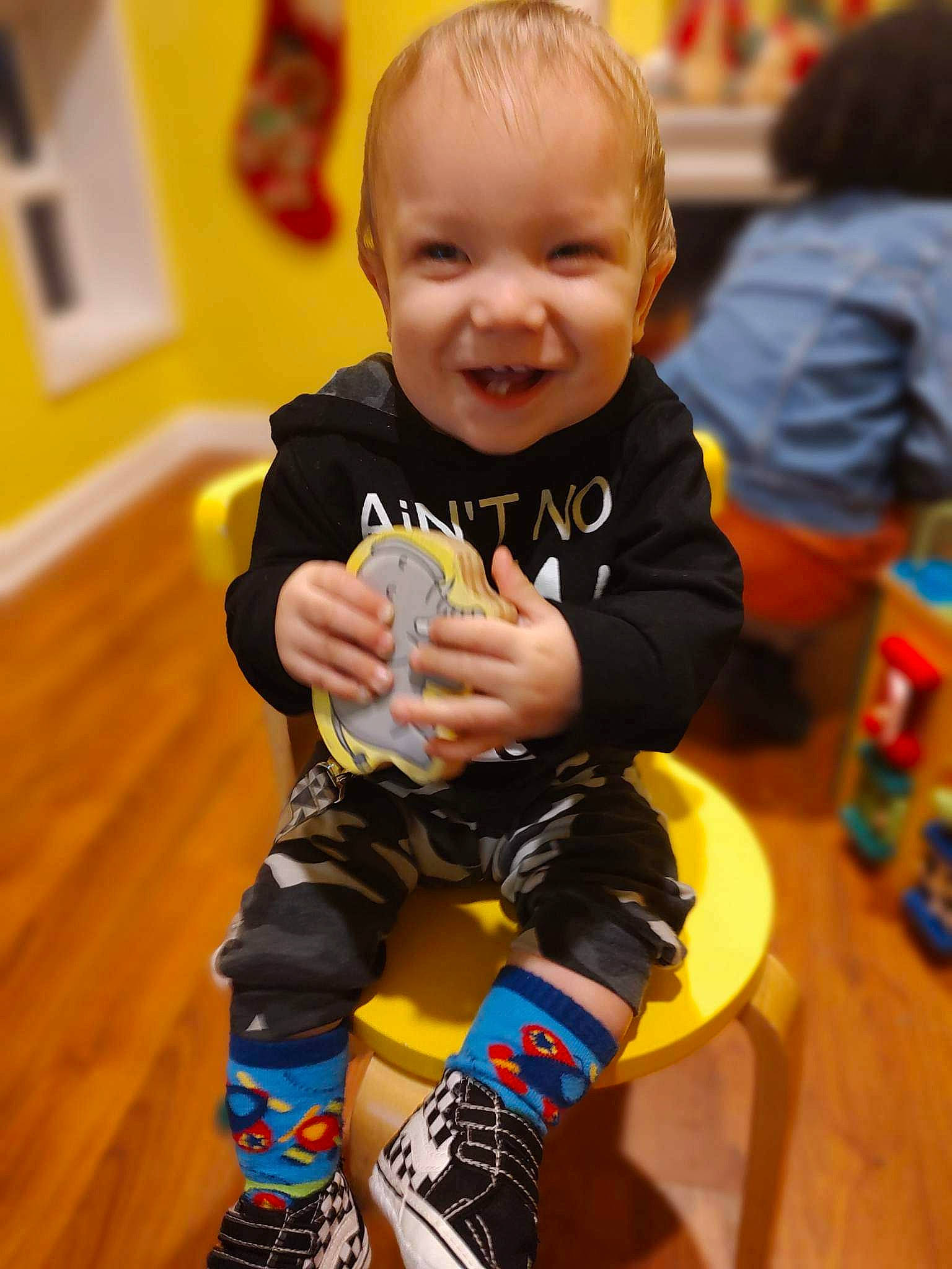 Dean joined the competition — help win amazing prizes! baby, baby_toddler_clothing, child, event, flooring, fun, happy, human_leg, joy, person, photograph, play, room, sitting, skin, sleeve, smile, standing, thigh, thumb
