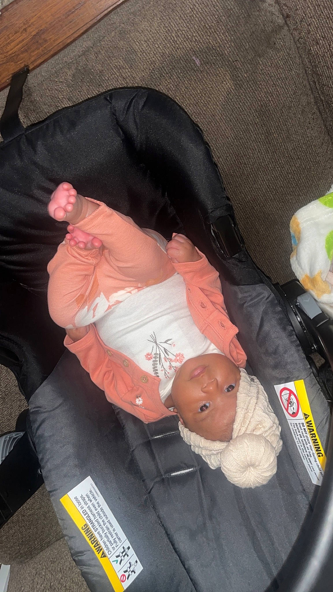 Camila joined the competition — help win amazing prizes! baby, baby_carriage, baby_products, baby_toddler_clothing, car_seat, comfort, event, flesh, fun, gesture, headwear, human_leg, lap, person, product, sitting, sock, thigh, toddler, wrist