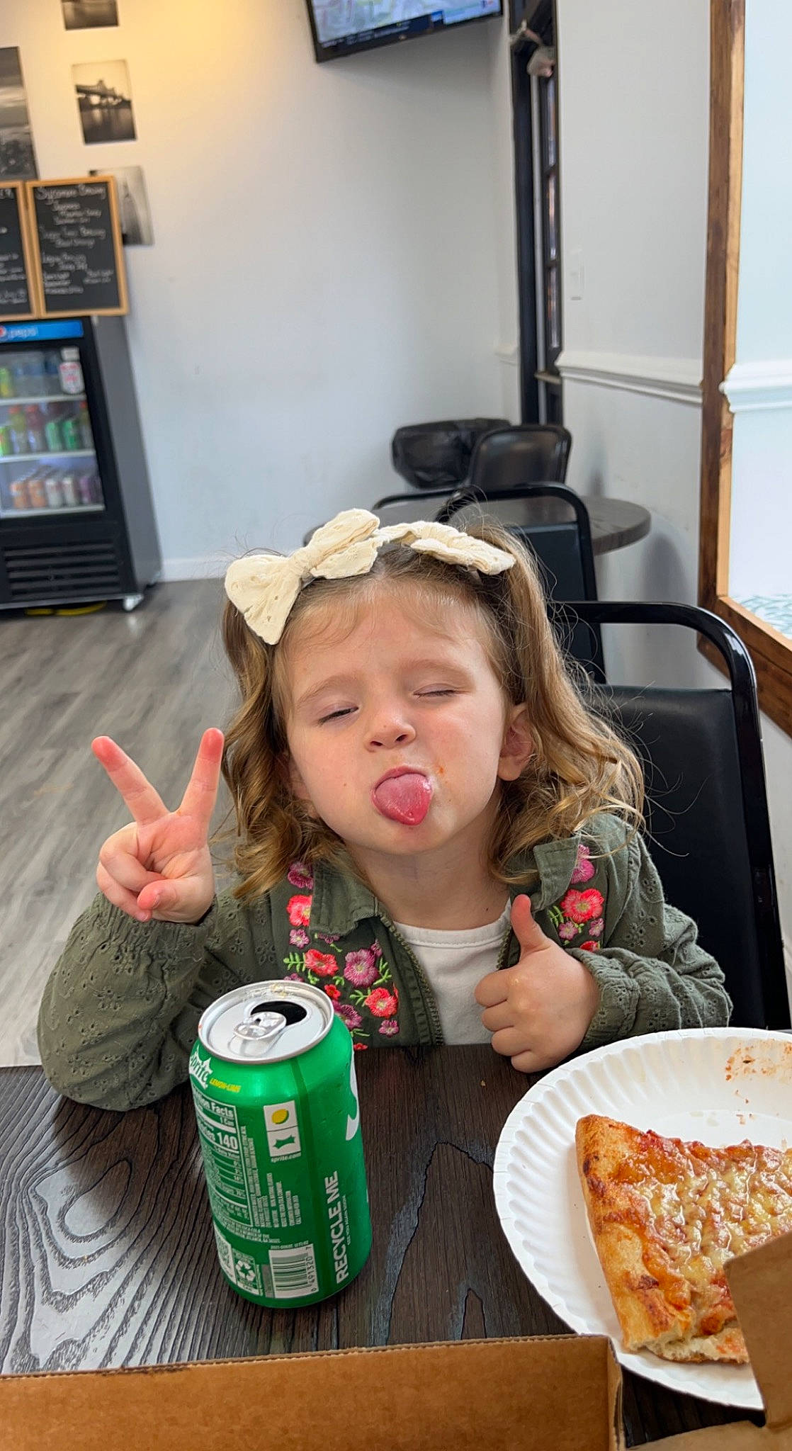 Macy joined the competition — help win amazing prizes! aluminum_can, chair, child, comfort_food, drink, drinking, drinkware, finger_food, food, food_craving, ingredient, junk_food, person, pizza, plate, sharing, soft_drink, sunglasses, table, tableware