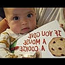 Sophia joined the competition — help win amazing prizes! baby, child, face, eyes, book, reading, clothing, person, indoor, infant, cute, expression, pajamas, holding, hand, portrait, young, curious, storytime, literacy